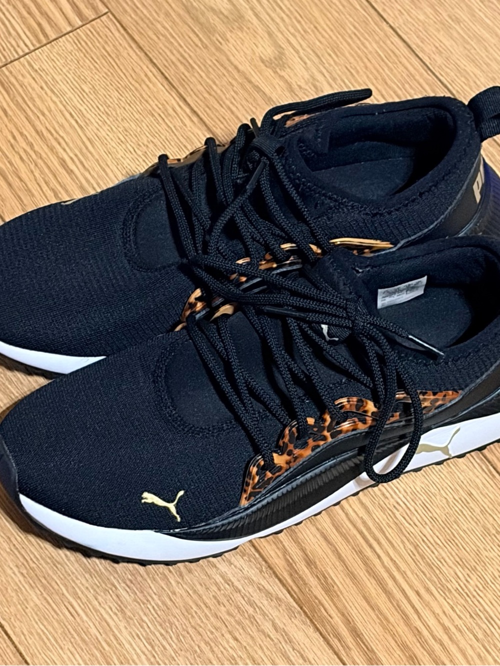Puma Men's Black Athletic Sneakers with Leopard Accents and Gold Logo
